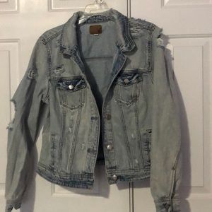 Light blue ripped denim jacket